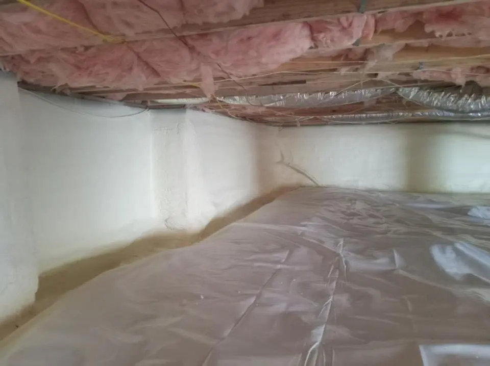 Crawl space encapsulation with closed-cell spray foam for Commercial Roof Restoration in Ridgefield